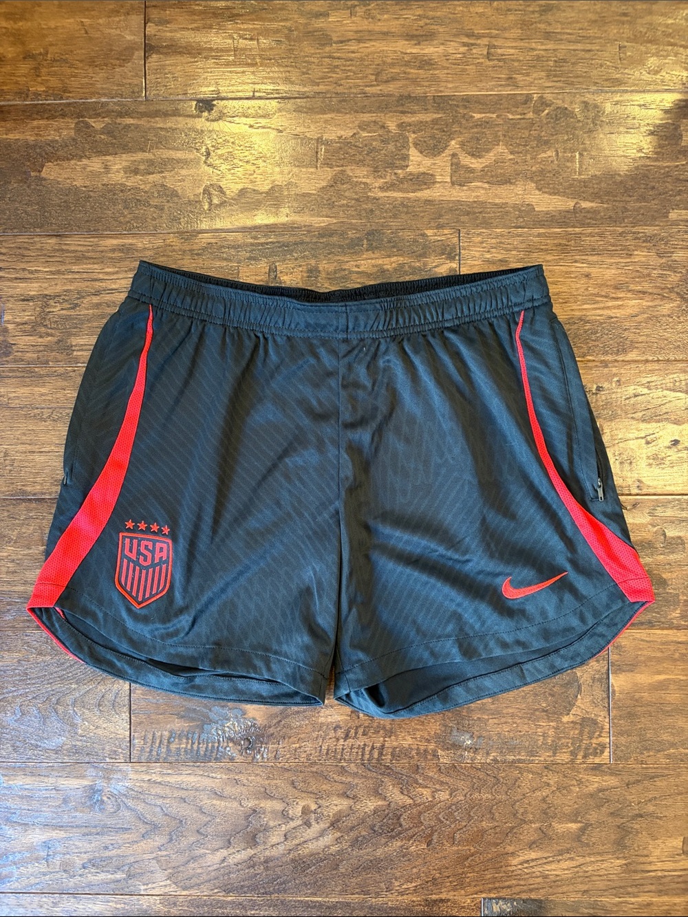 Nike Women’s Black Athletic Shorts with Red Accents